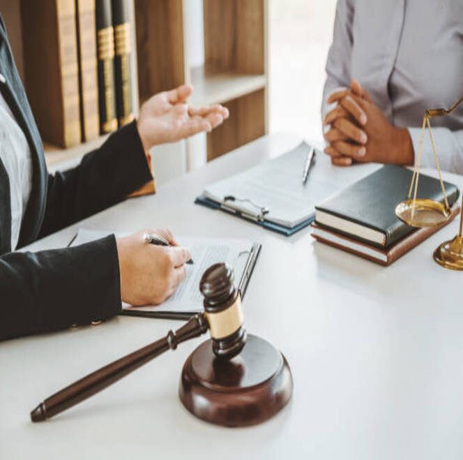 Legal consultation with gavel and documents.