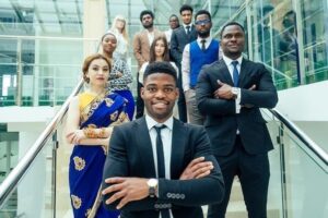 A group of people in suits and ties standing together.